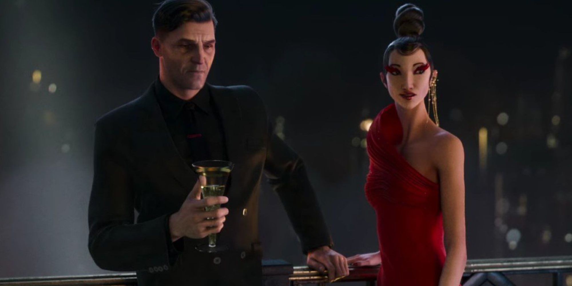 A man and a woman in red talking to someone 