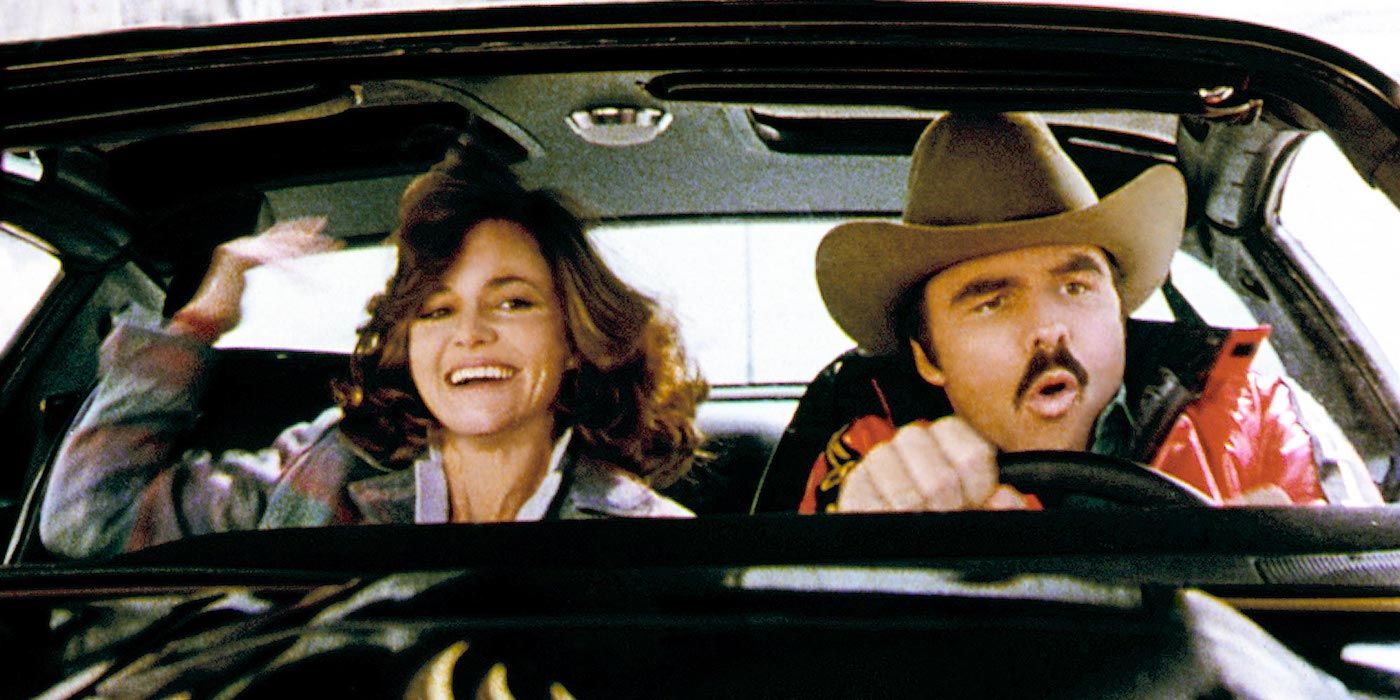 A man and a woman in a car in Smokey and the Bandit.