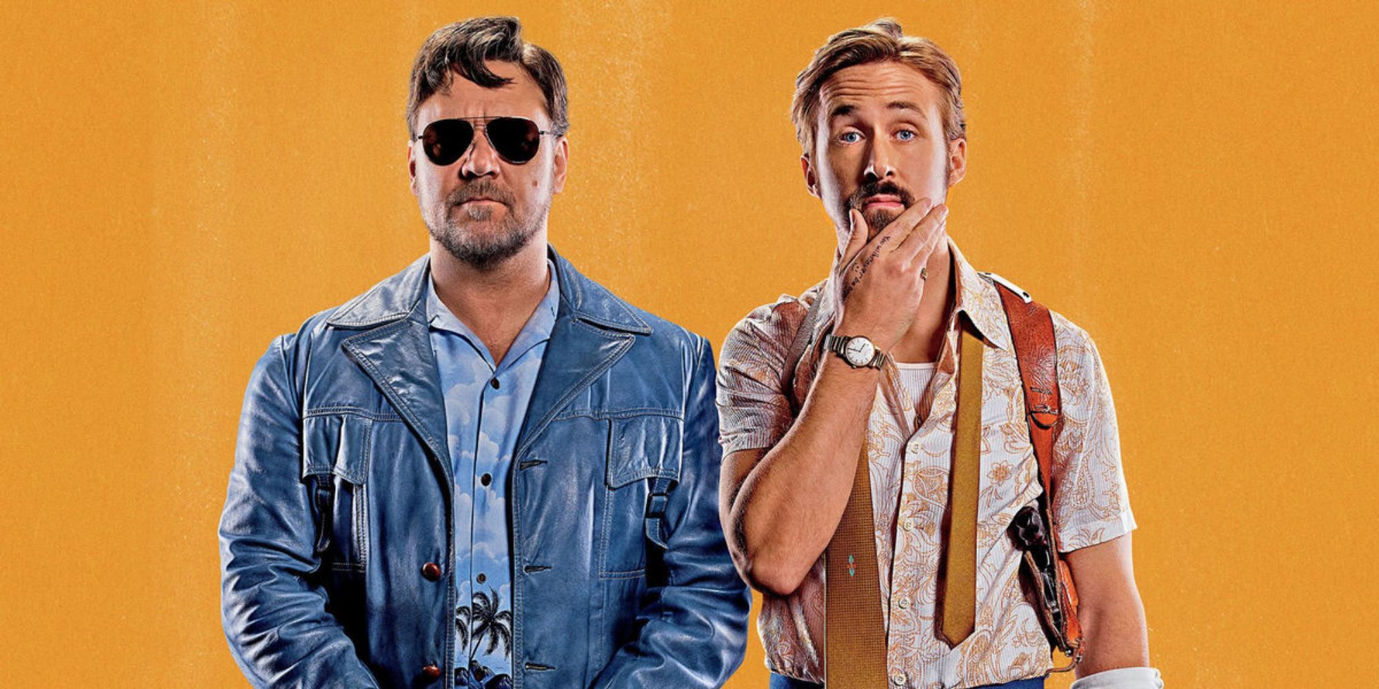 Russell Crowe and Ryan Gosling in 70s outfit posing for a promo image for The Nice Guys