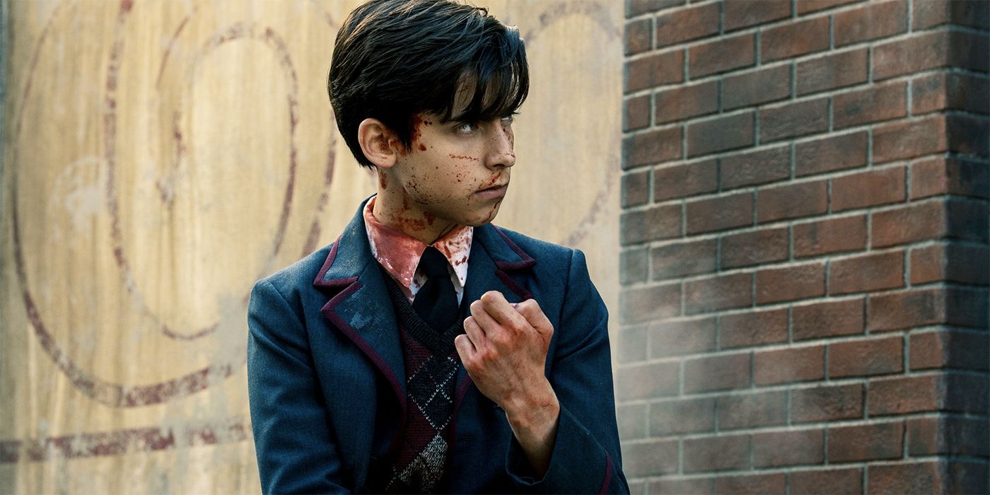 Aidan Gallagher as Number Five covered in blood in The Umbrella Academy.