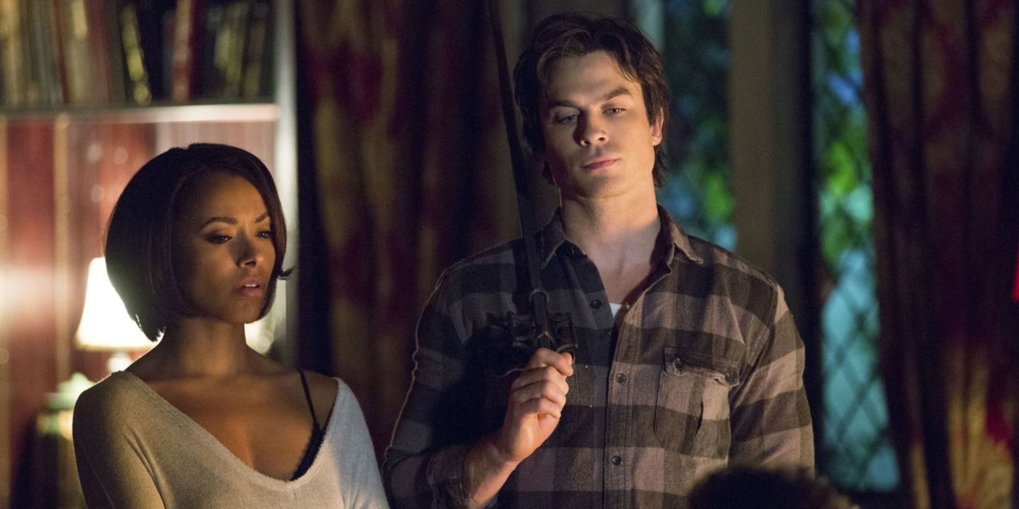 Bonnie and Damon from The Vampire Diaries standing together