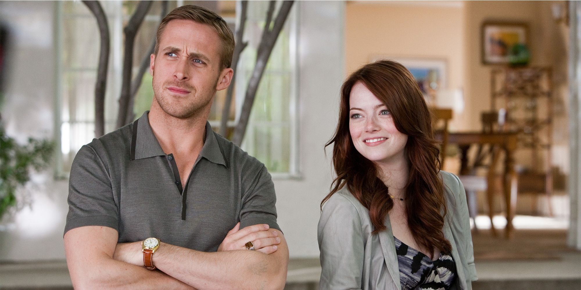 Jacob, played by Ryan Gosling, stands by Hannah, played by Emma Stone, in 'Crazy, Stupid, Love'.