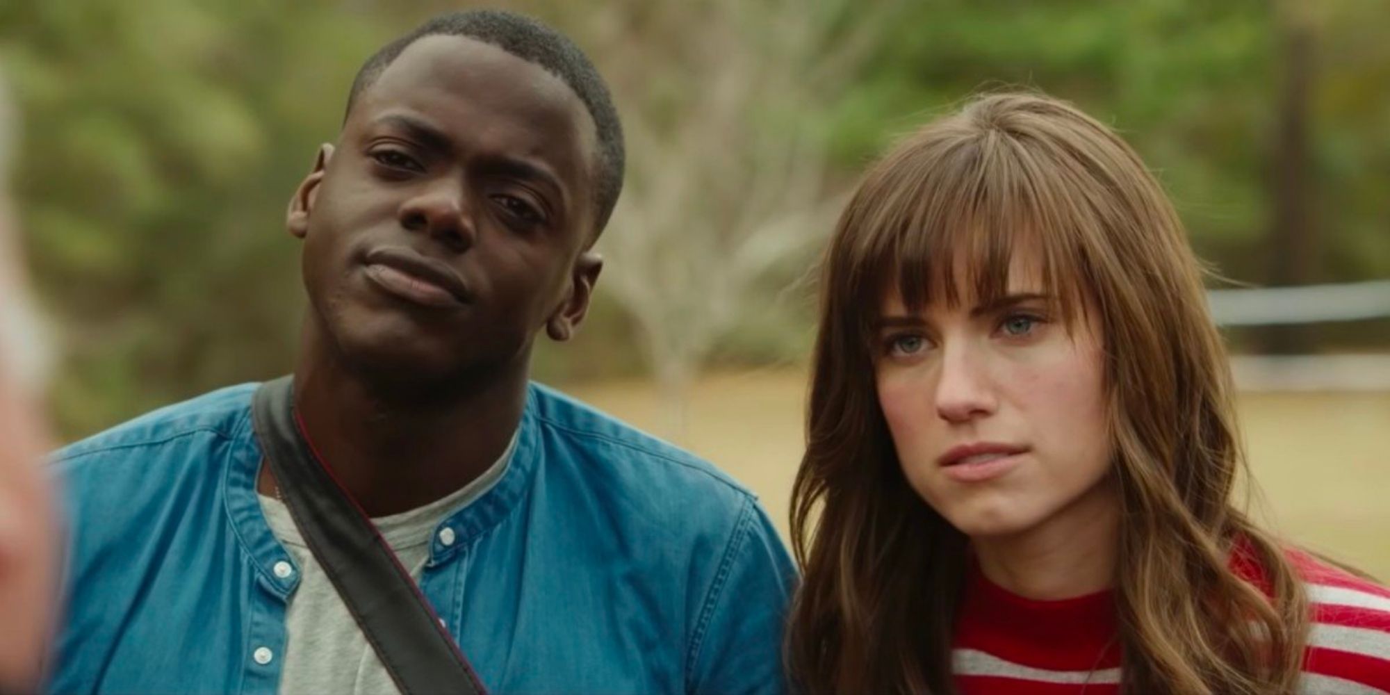 Daniel Kaluuya and Allison Williams as Chris and Rose, looking annoyed in Get Out