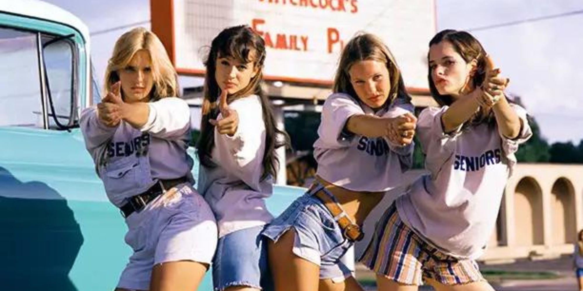 The cheerleaders from Dazed and Confused posing for a picture