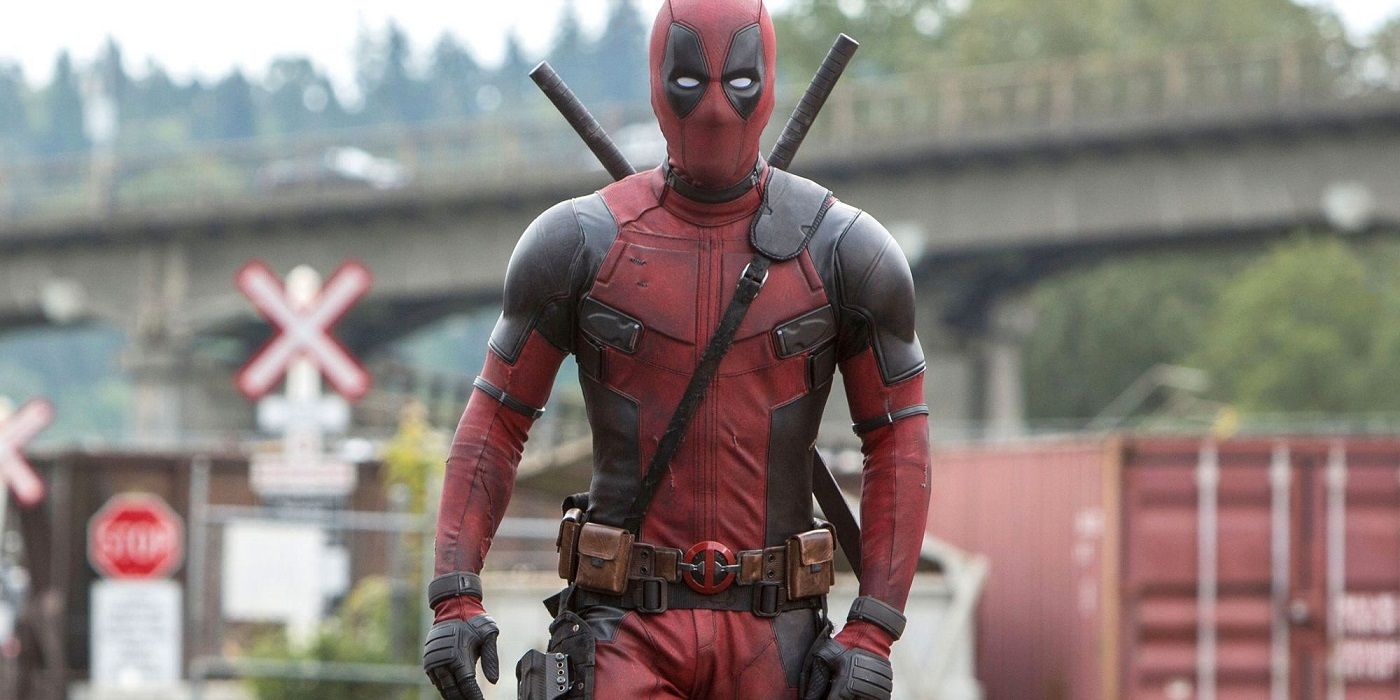 Ryan Reynolds as Wade Wilson/Deadpool walking down the street in the Deadpool franchise
