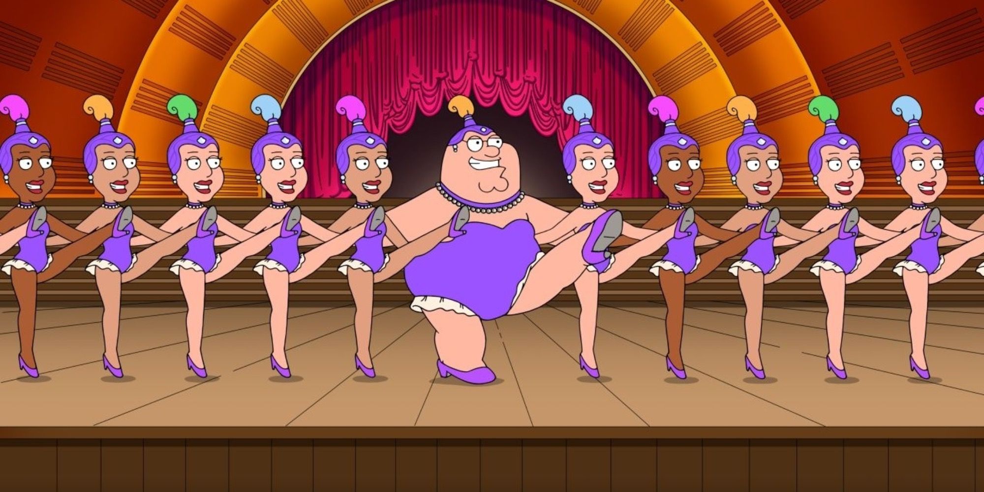 Peter in feminine clothing, dancing in a line with dancers