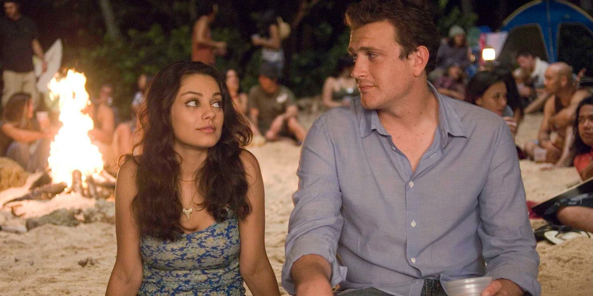 Mila Kunis and Jason Segel sitting together in Forgetting Sarah Marshall