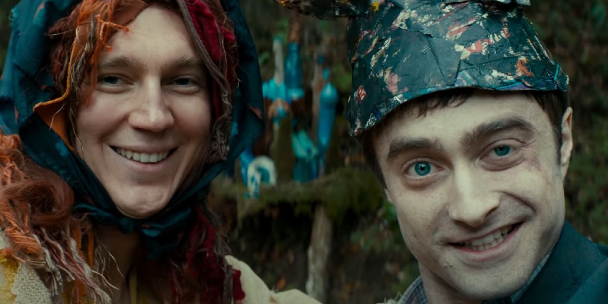 Paul Dano and Daniel Radcliffe in Swiss Army Man laughing and staring weirdly