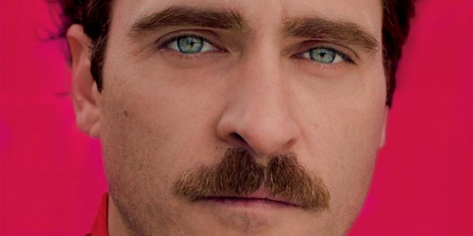 Joaquín Phoenix in the Her poster
