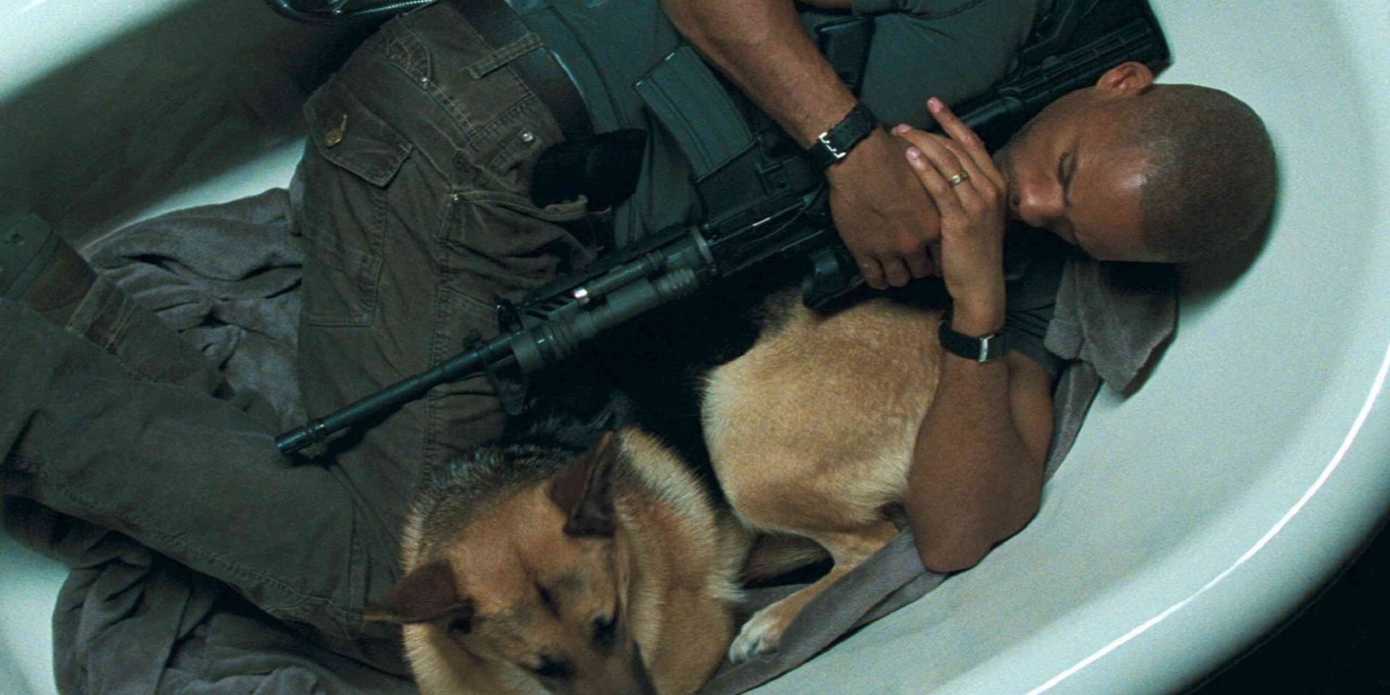Will Smith and his dog laying in a bathtub in I Am Legend.