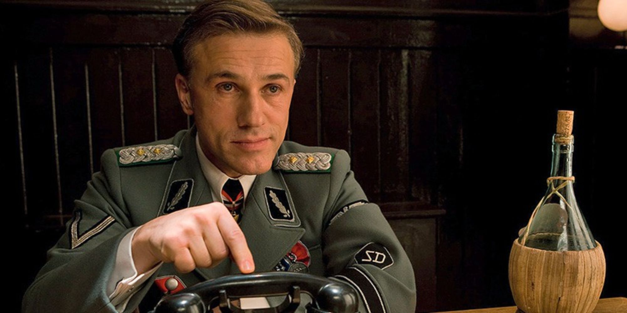 Hans Landa pointing to a telephone in Inglourious Basterds