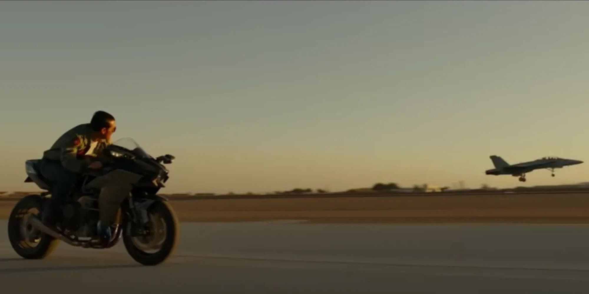 Maverick from Top Gun: Maverick, racing against a plane with his motorcycle