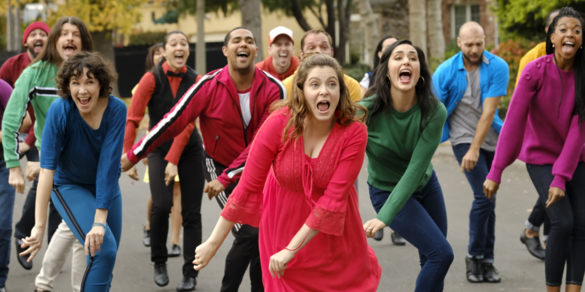 Rachel Bloom and cast members dance and sing in a city street on Crazy Ex-Girlfriend.