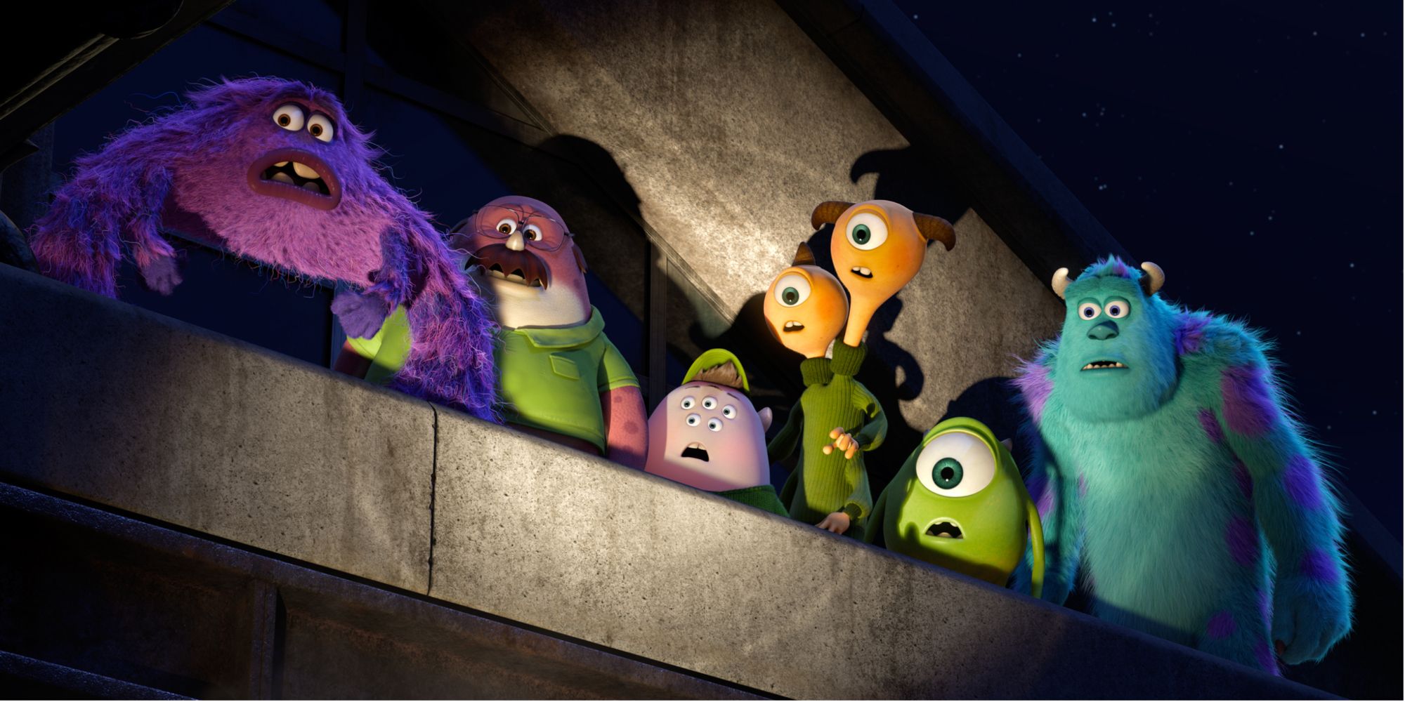 Mike and Sully with the Oozma Kappa crew in Monsters University
