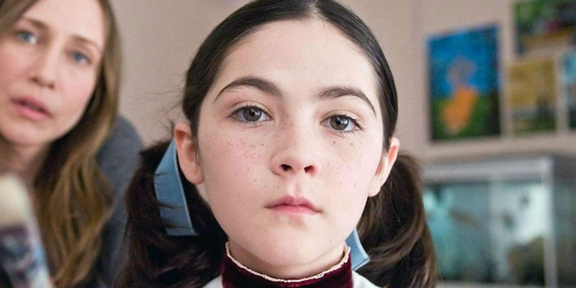 Isabelle Fuhrman as Esther stares at the camera in Oprhan