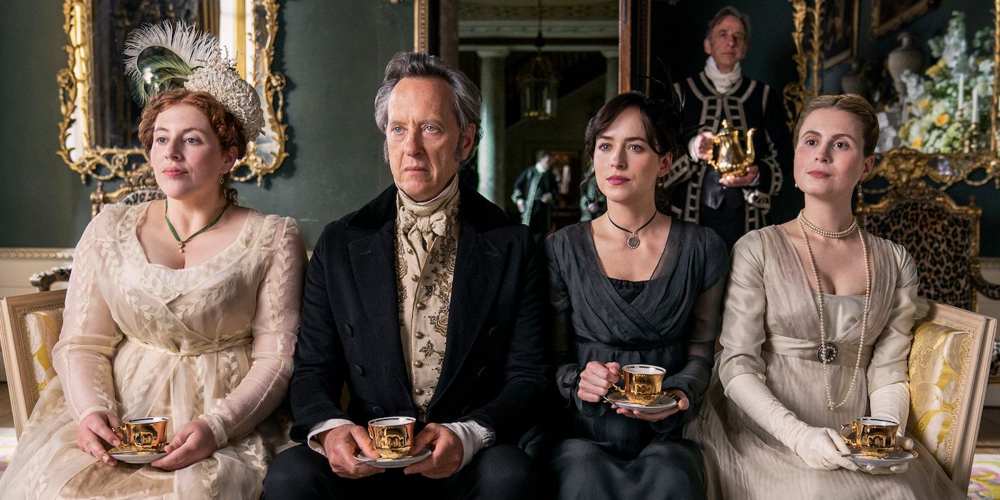 Anne Elliot and her family sitting on a sofa and holding teacups in Persuasion.