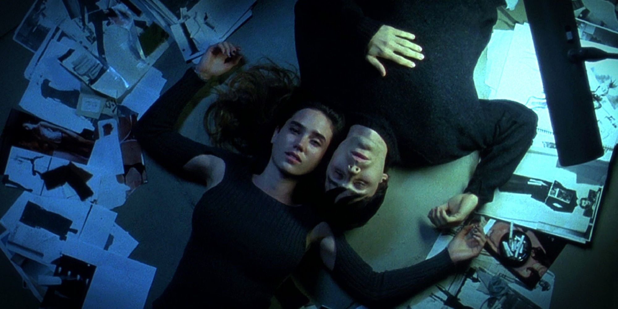 Harry and Marion laying on the floor in Requiem for a Dream