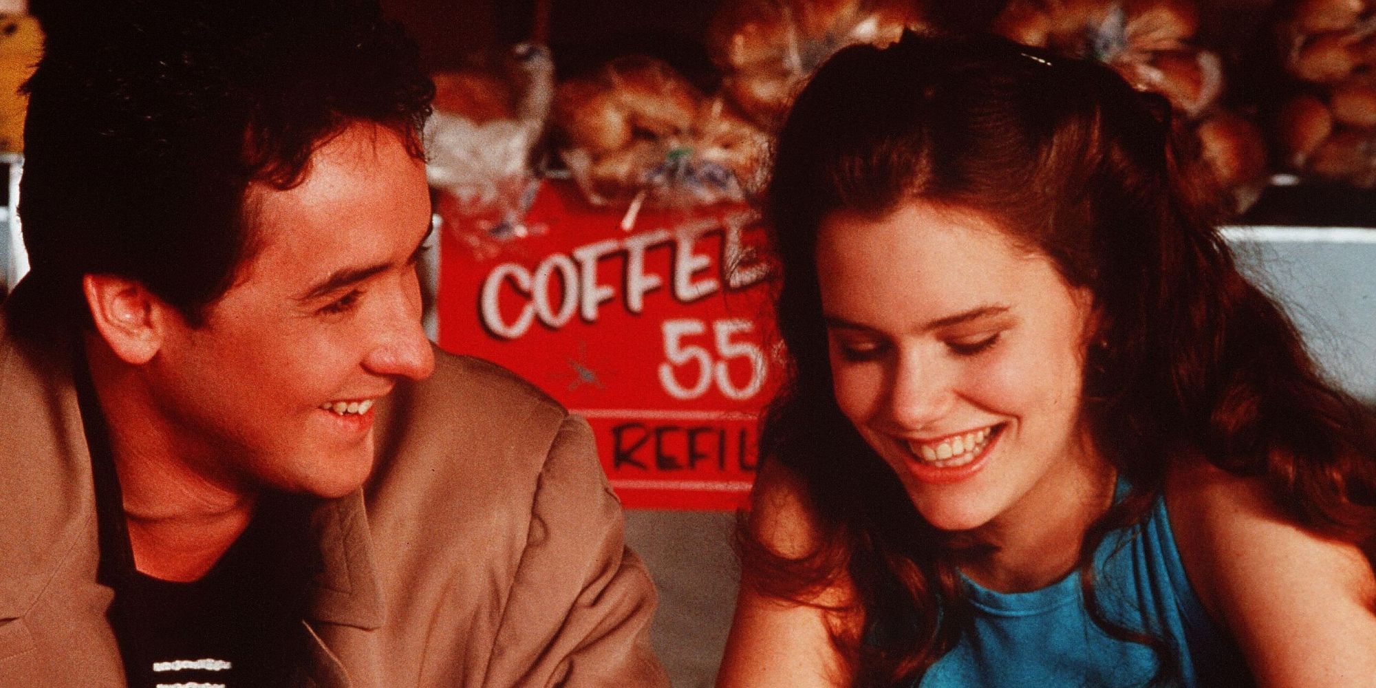 Lloyd and Diane from Say Anything smiling