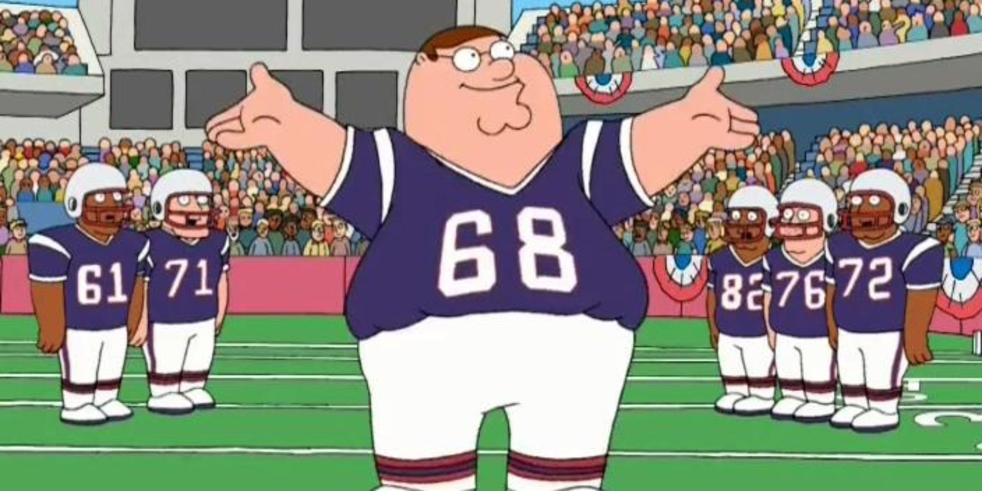 Peter singing to an audience at a football game
