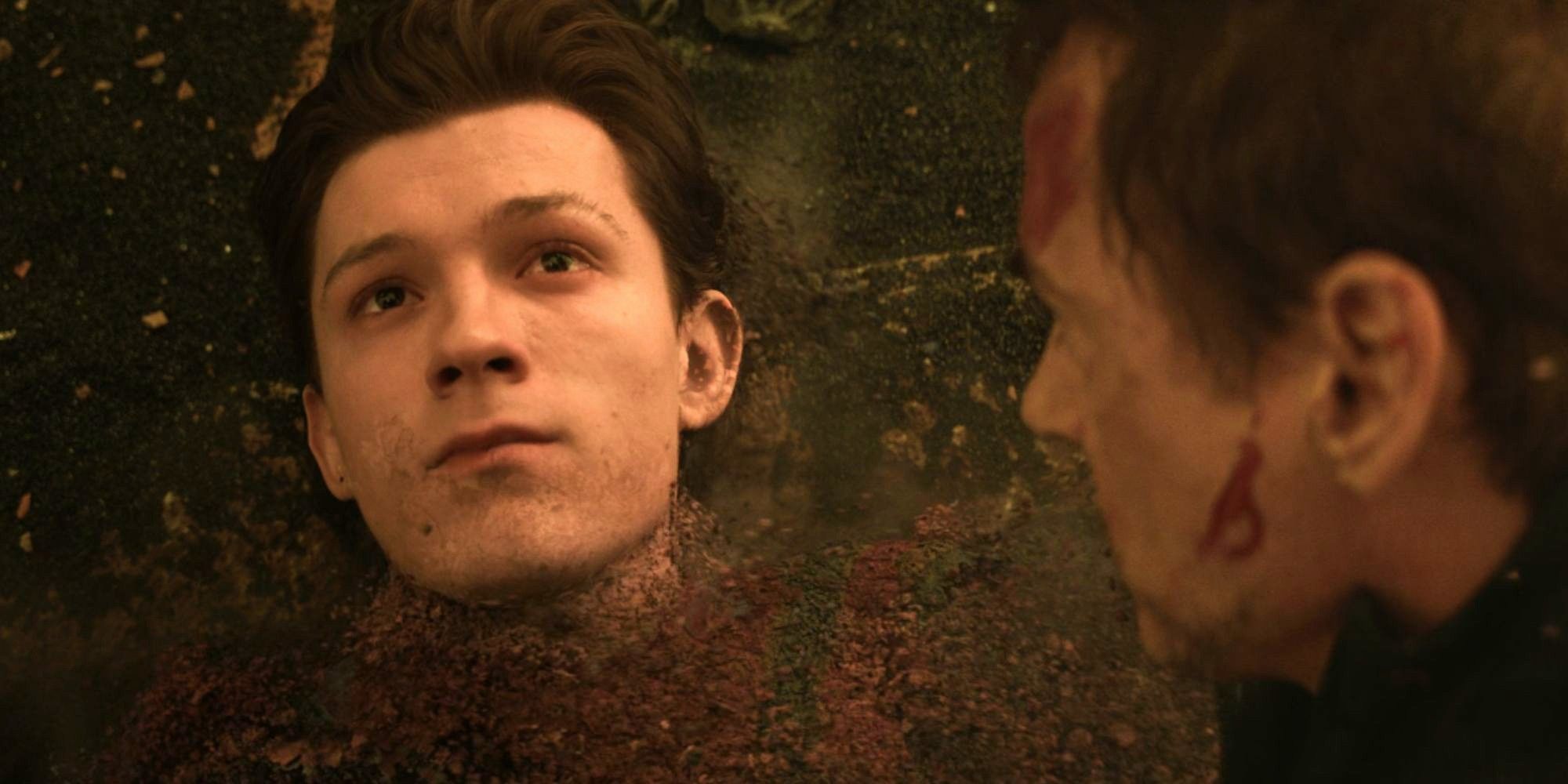 Peter Parker (Tom Holland) turns to dust in Tony Stark's (Robert Downey Jr.) arms in Avengers: Infinity War