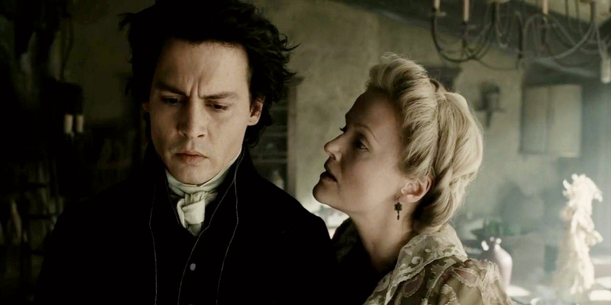 Lady Van Tassel whispering to Icabod Crane in Sleepy Hollow