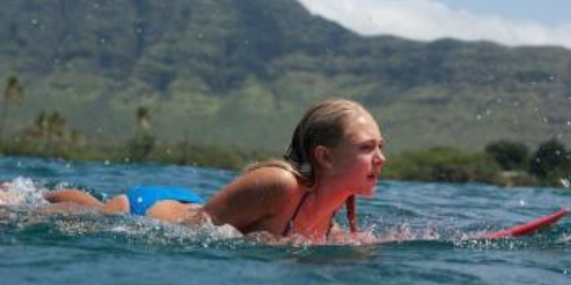 Riding Surfboard