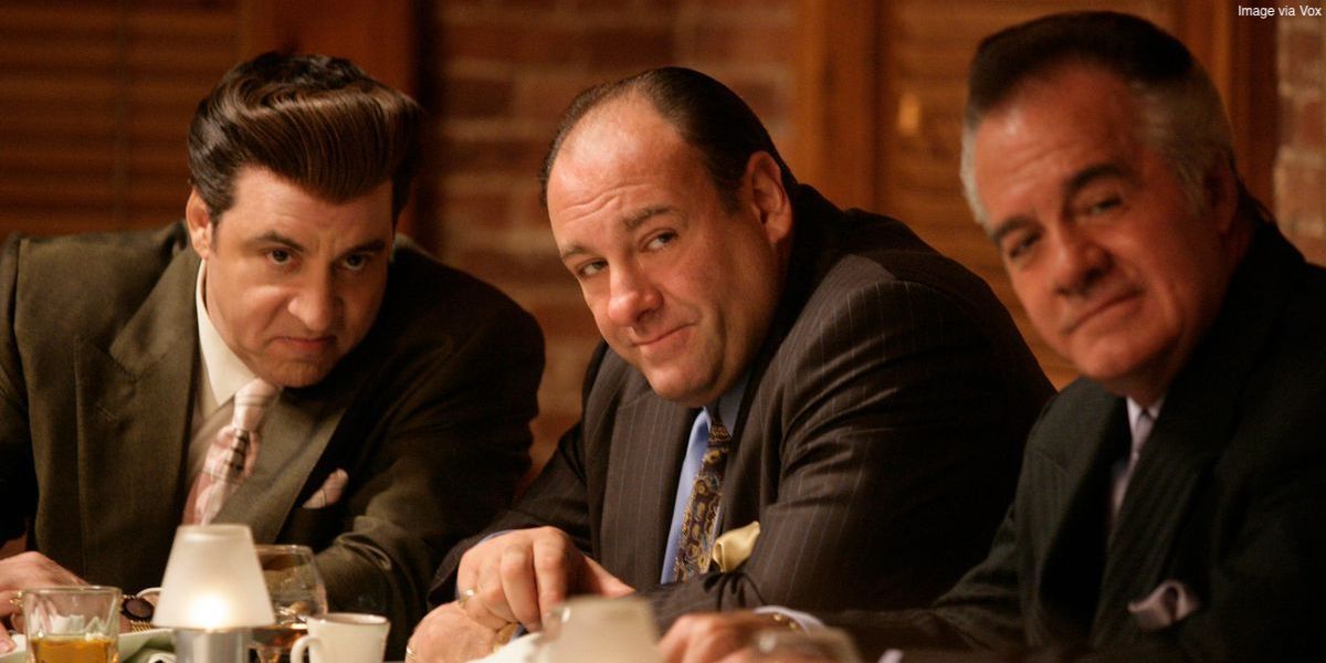 Tony Soprano and two men looking in the same direction in The Sopranos