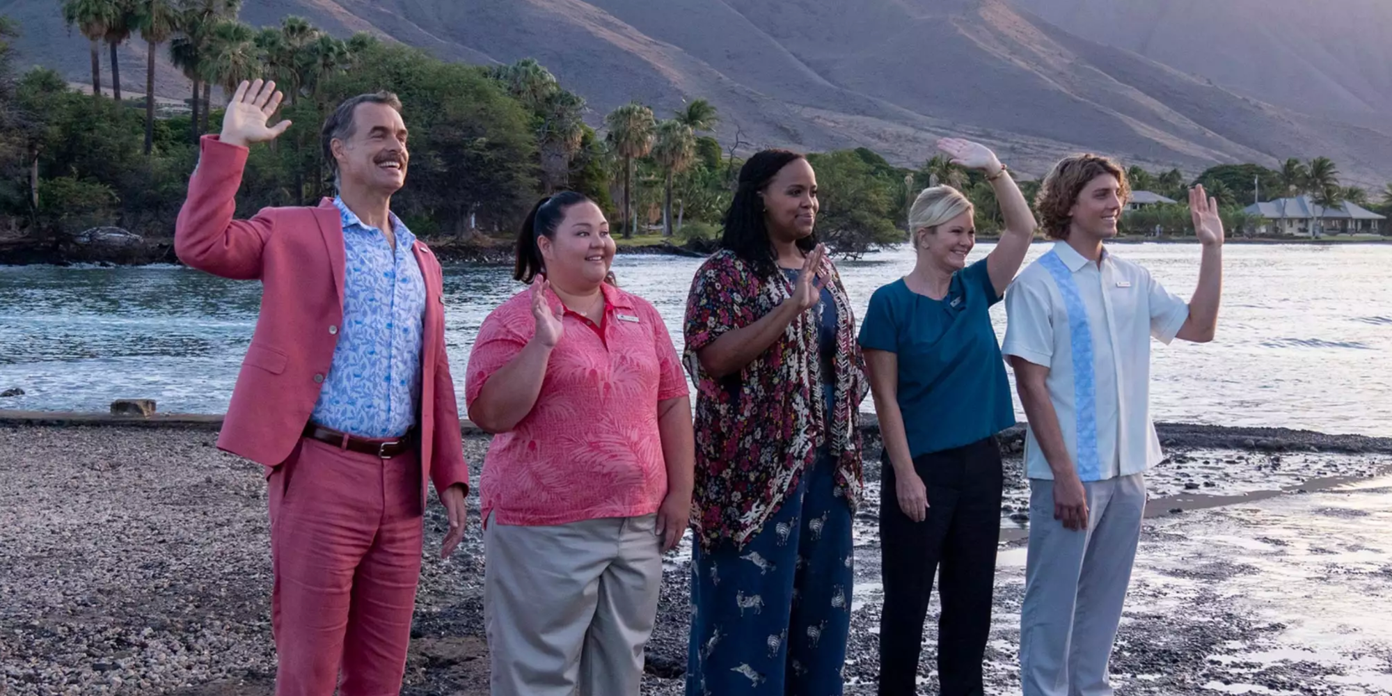 The White Lotus Staff on a beach