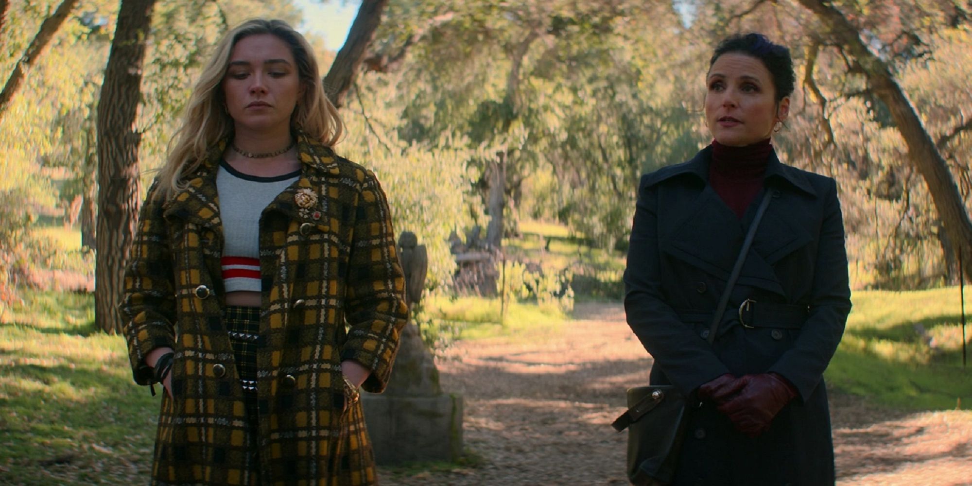 Yelena Belova and Valentina Allegra de Fontaine at the cemetery