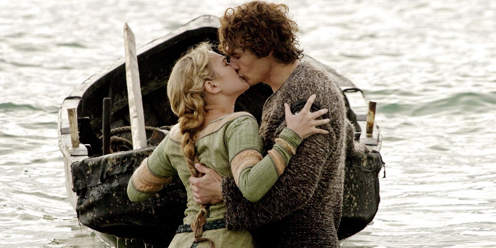 Tristan and Isolde kiss while out at sea before Tristan leaves in a boat.