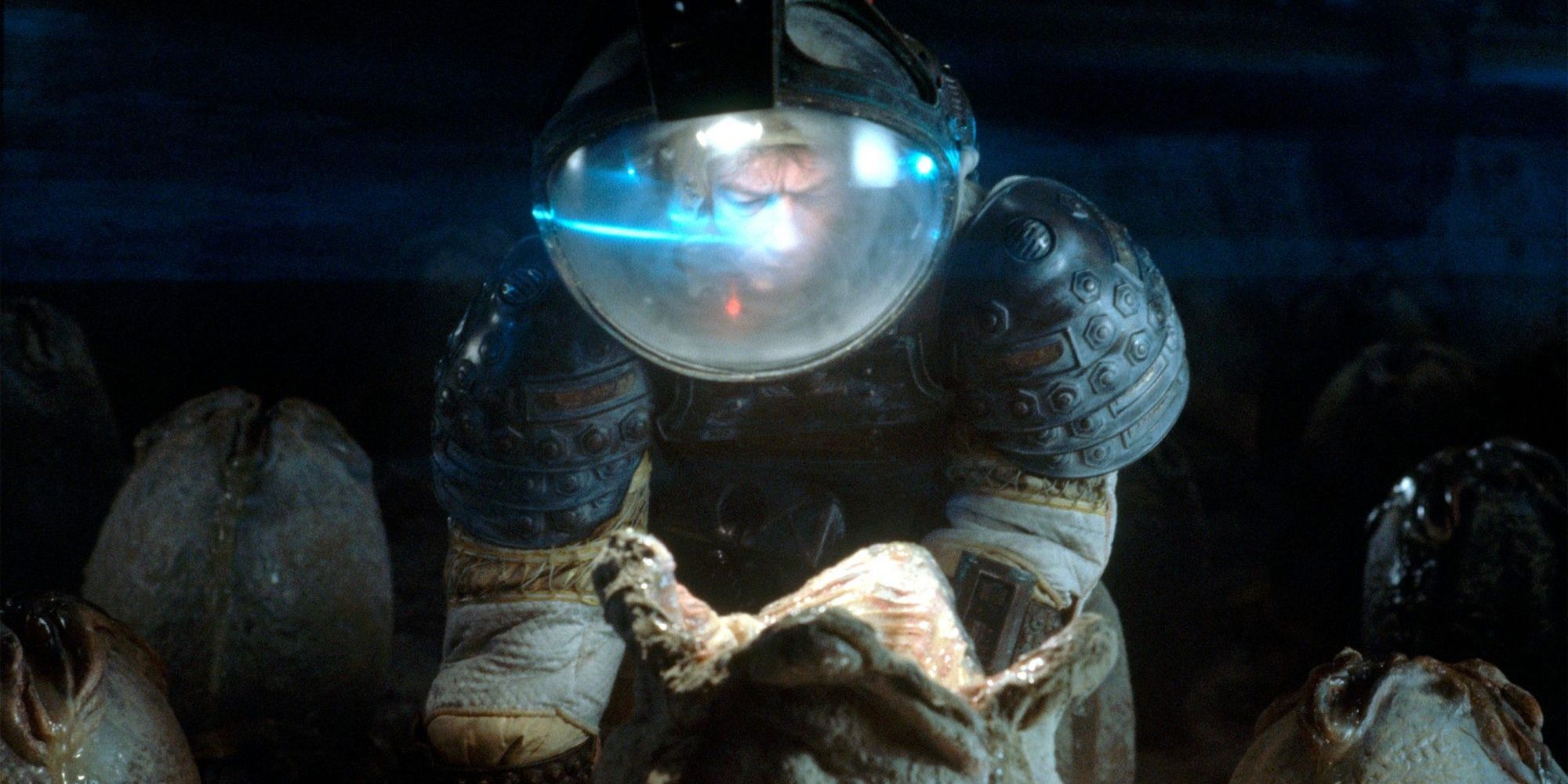 An explorer in a spacesuit looking inside an alien egg