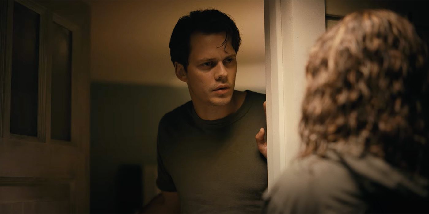 Bill Skarsgard answers the door in Barbarian