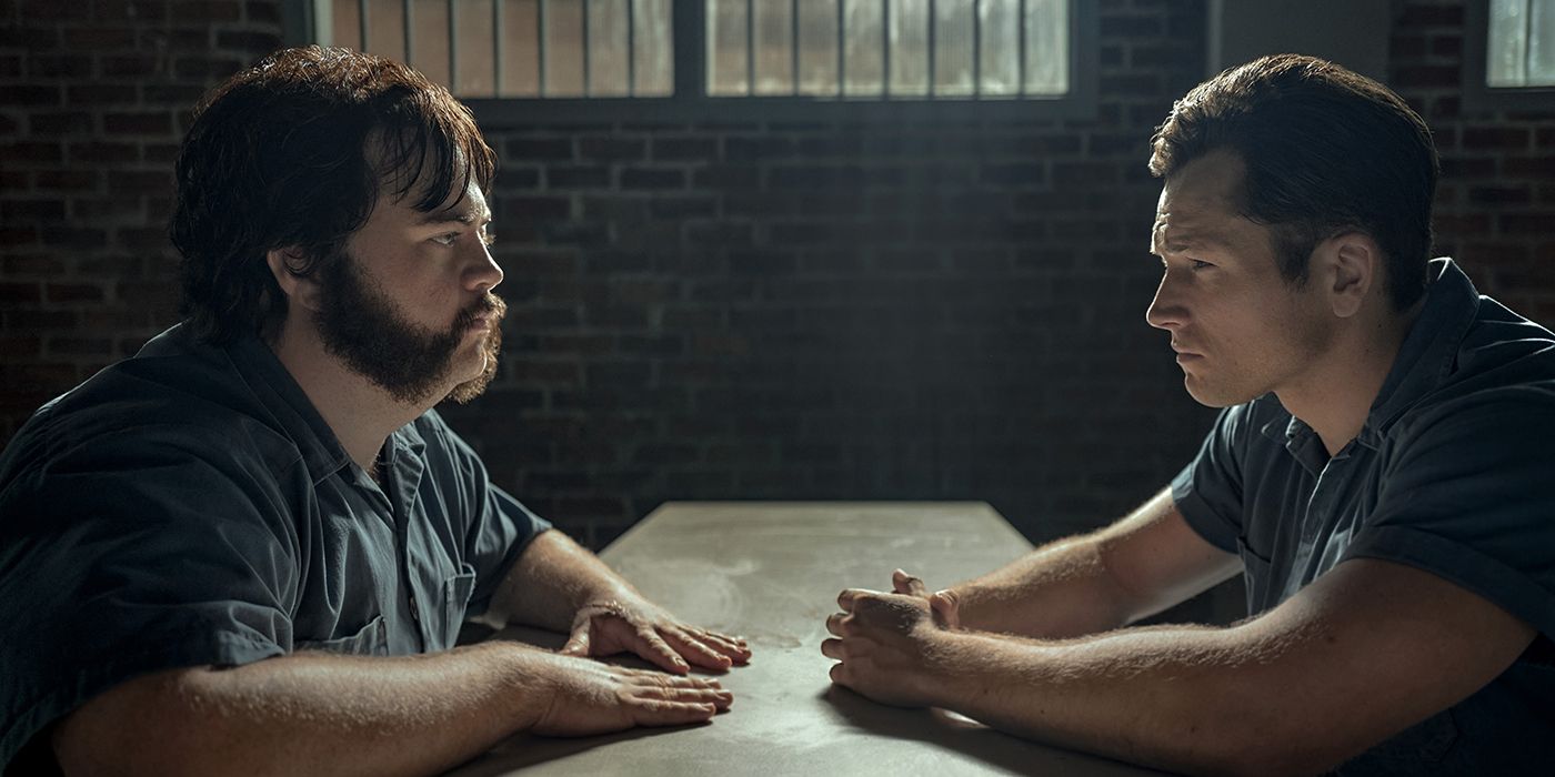 black bird's taron egerton and paul walter hauser talking inside prison