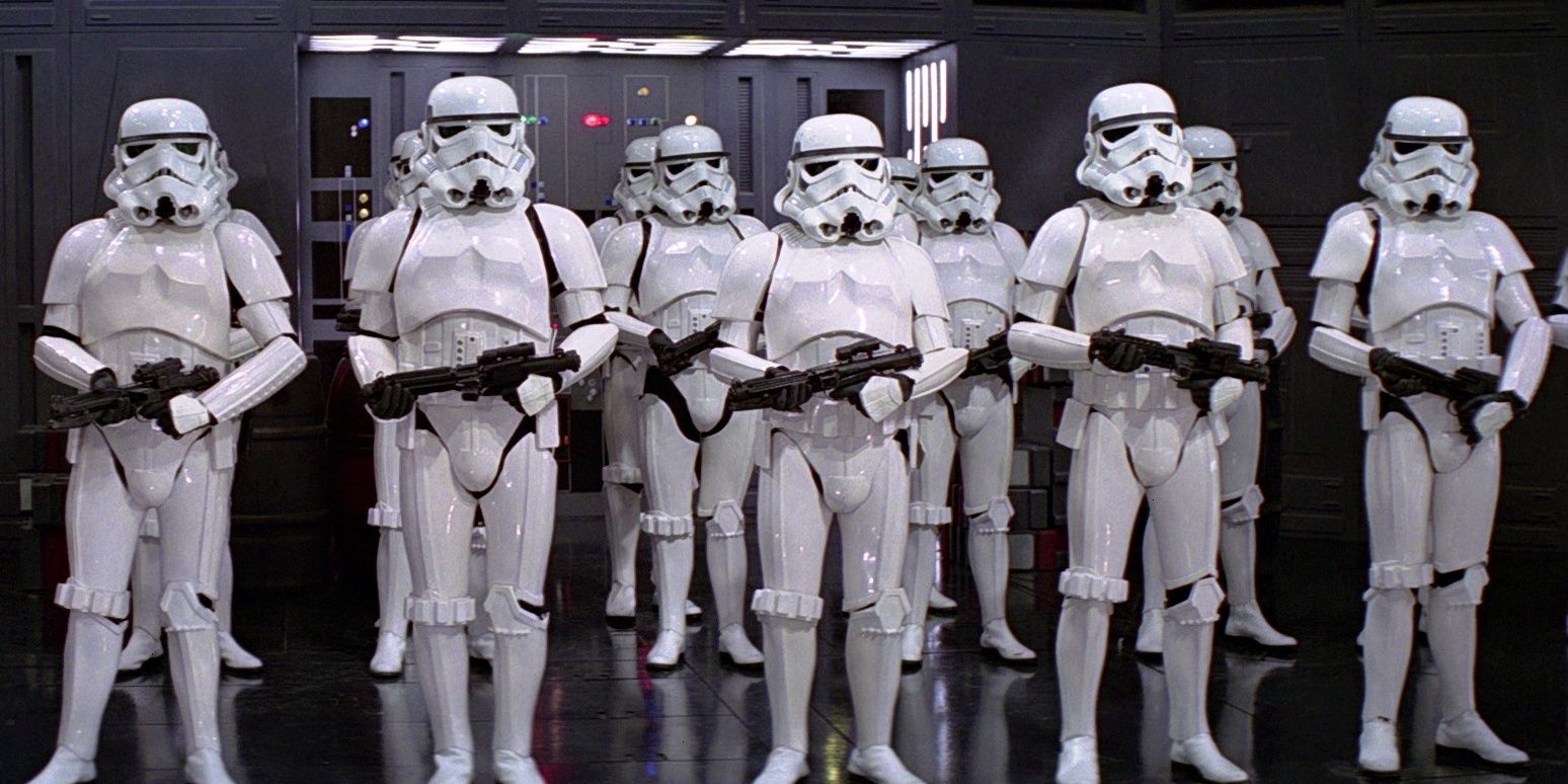 A group of Stormtroopers from 'Star Wars' stand in white armor holding blasters