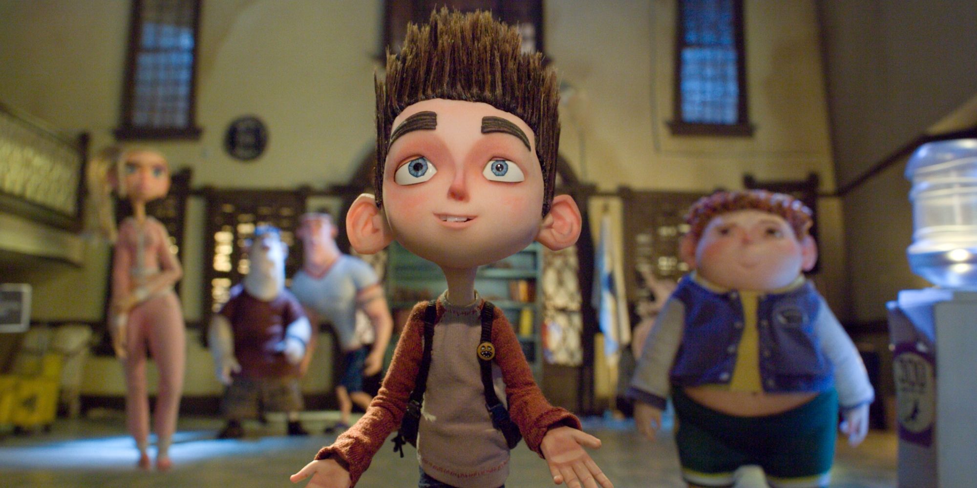 Norman standing in front of his friends and family in 'ParaNorman' (2012)