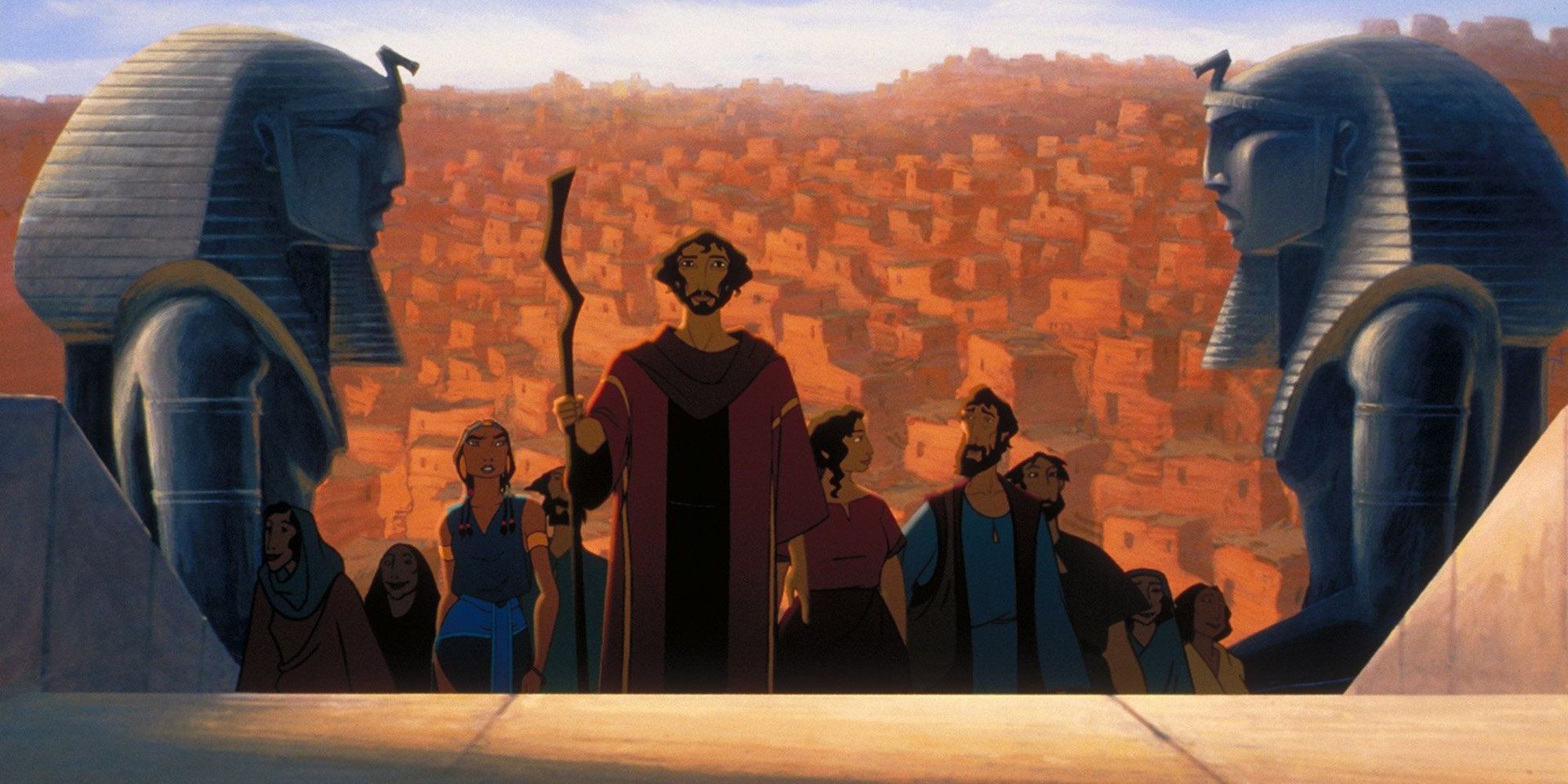 Moses walking through Egypt with the Israelites.