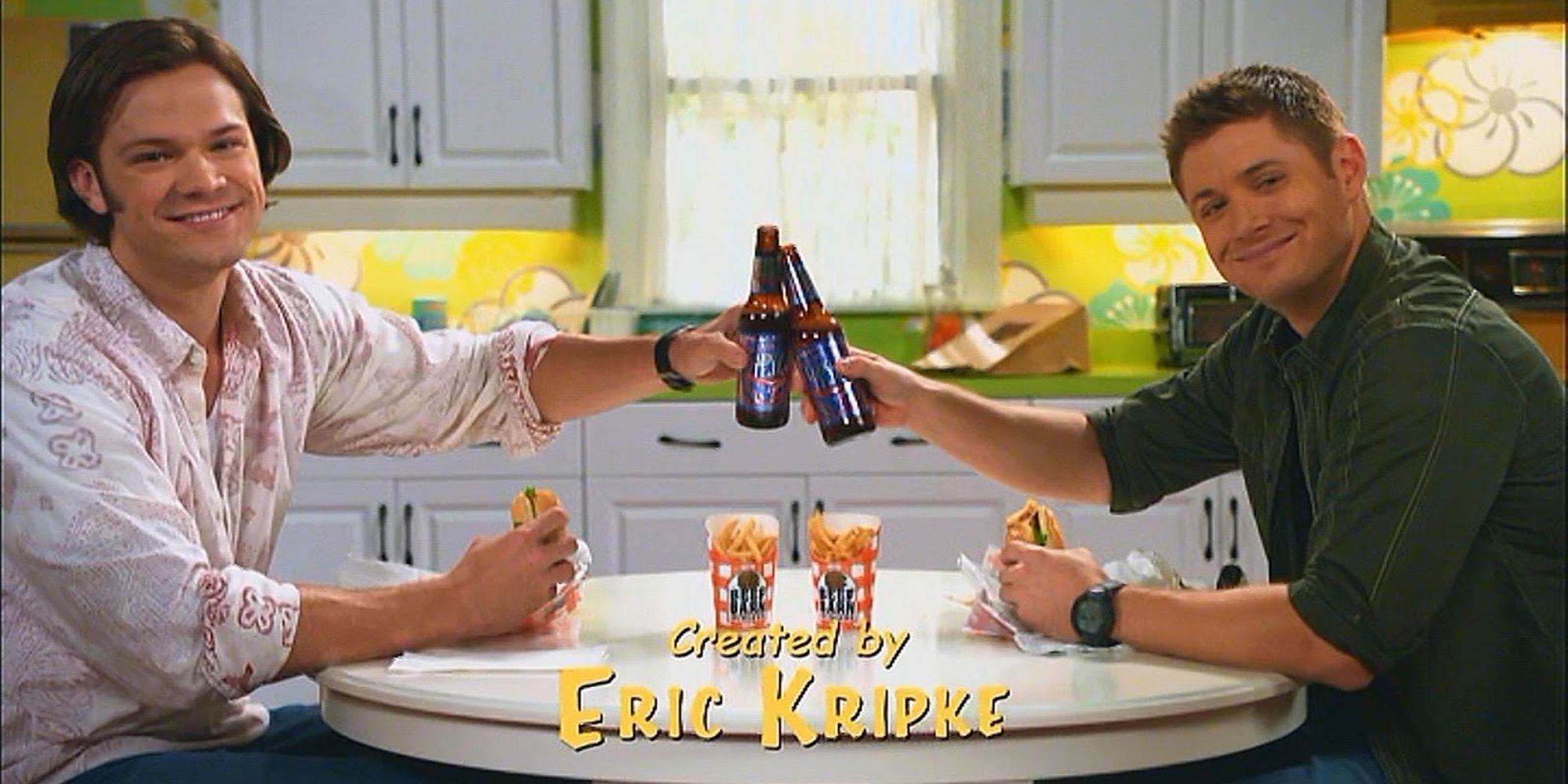 Sam and Dean using their beers to "cheers!" on Supernatural