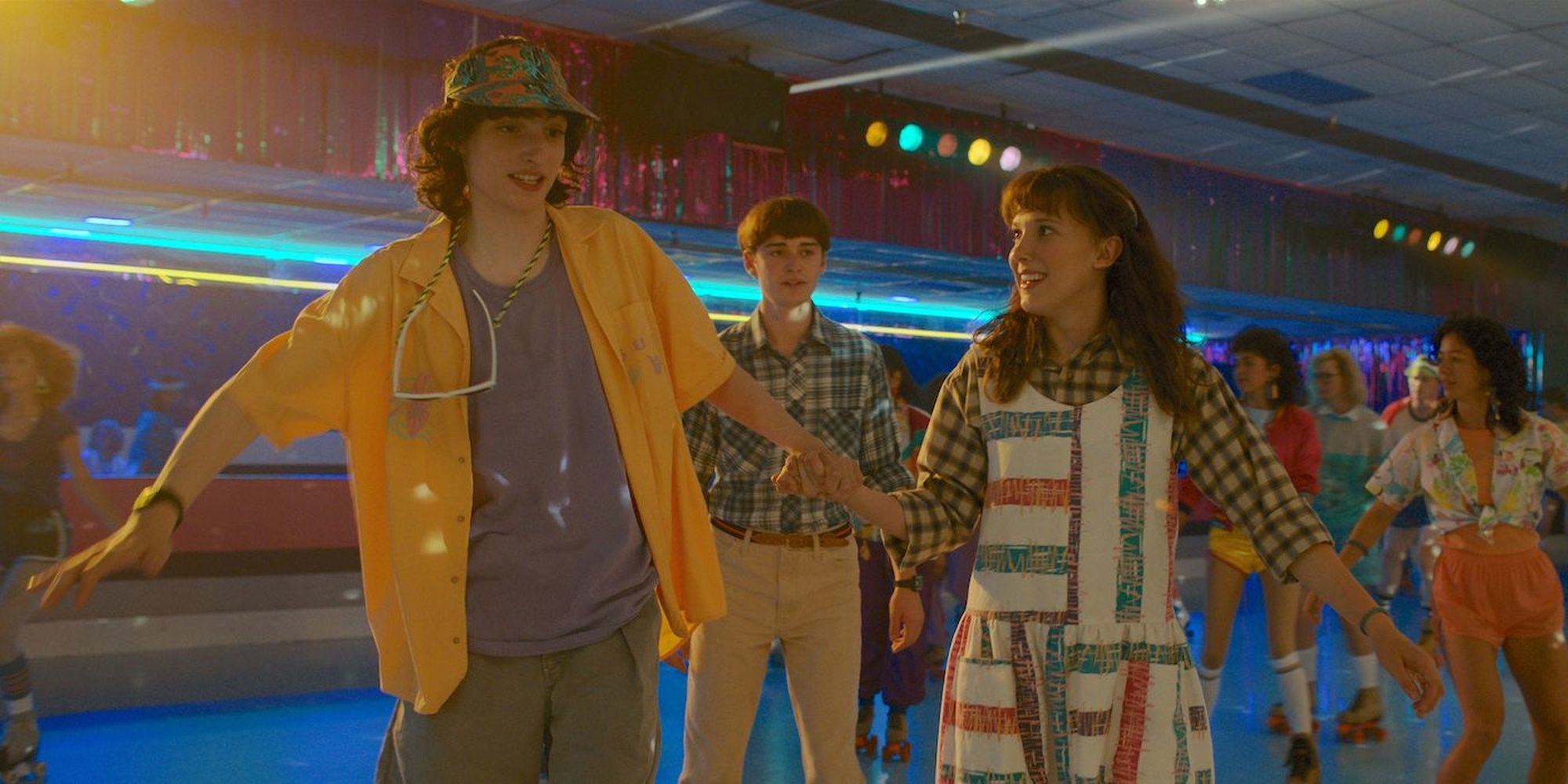 Mike, Eleven, and Will at a skating rink