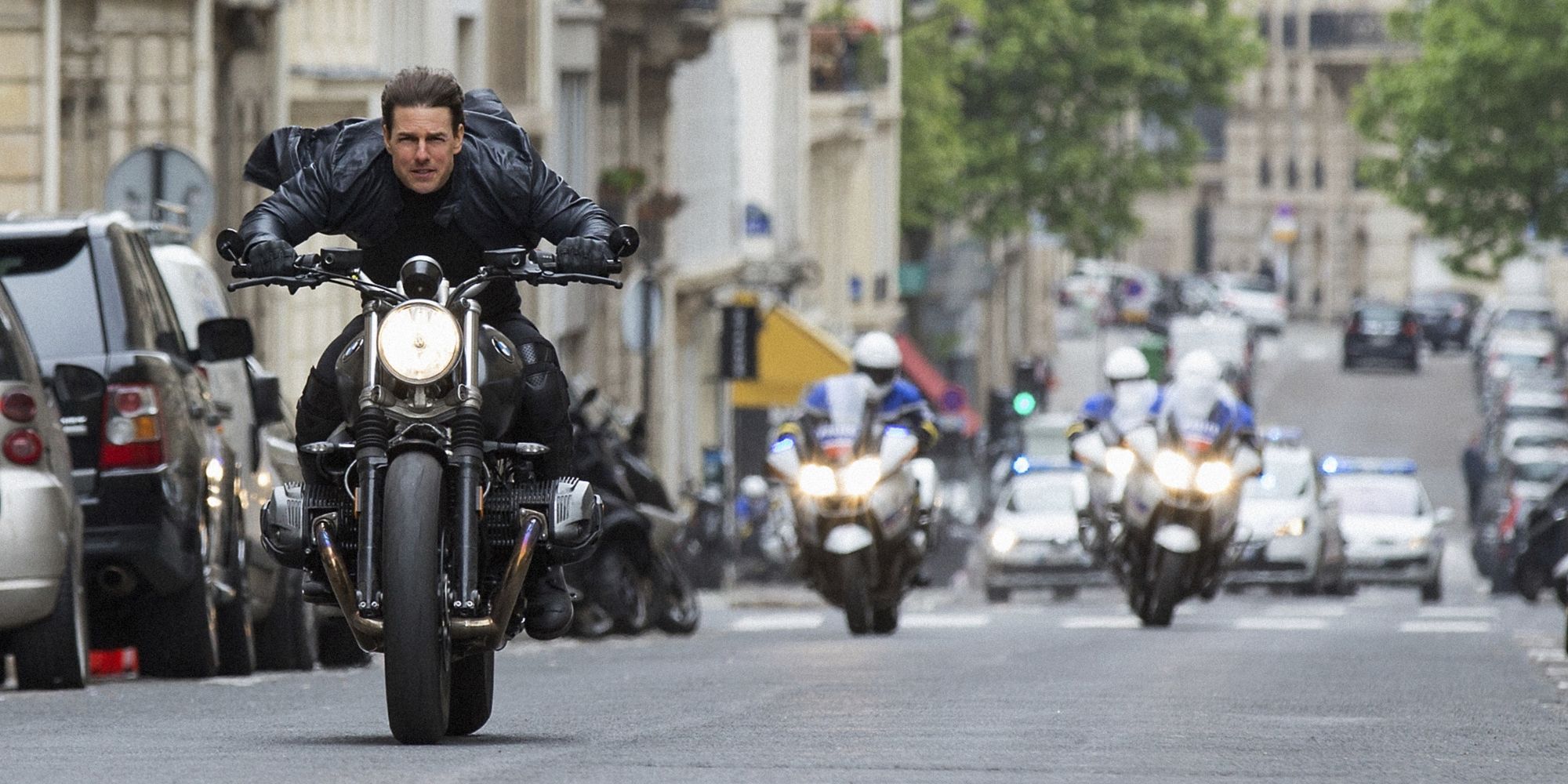 Ethan Hunt (Tom Cruise) riding a motorbike in 'Mission: Impossible - Fallout' (2014)