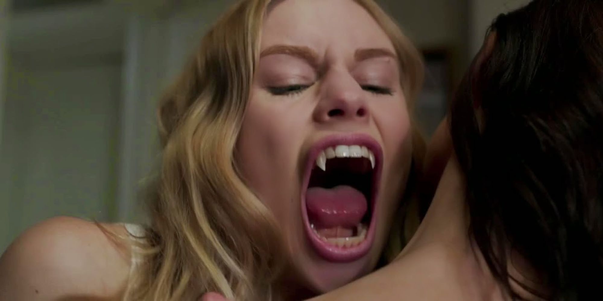 Lissa Dragomir about to bite Rose in Vampire Academy