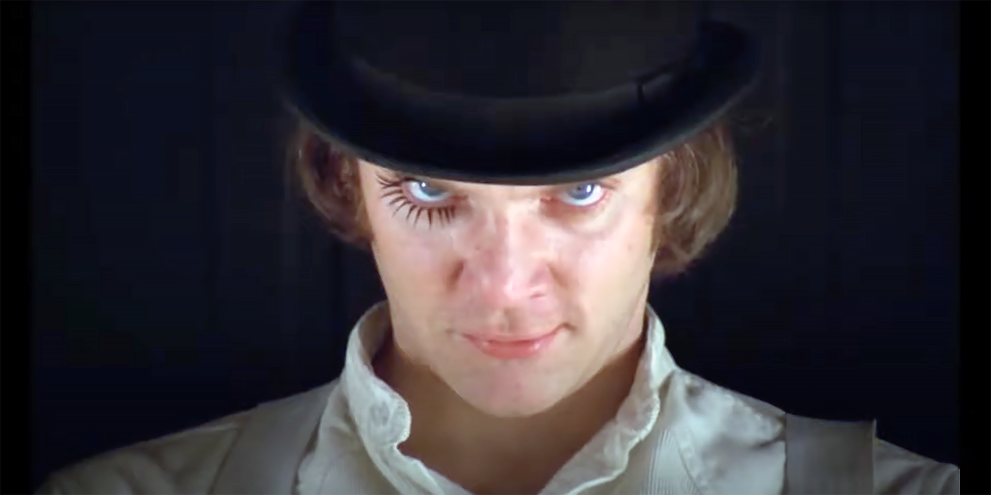Stanley Kubrick's fourth-wall-breaking opening scene in 'A Clockwork Orange' sets the tone for the rest of the movie
