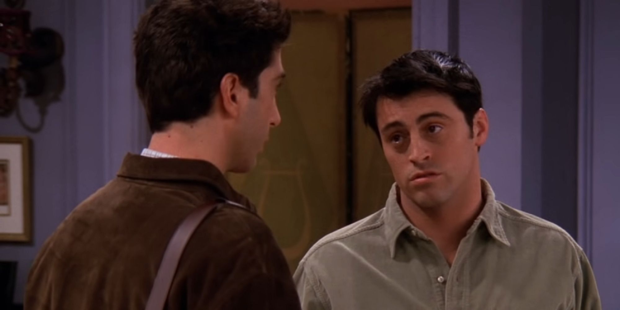 Joey looking at Ross