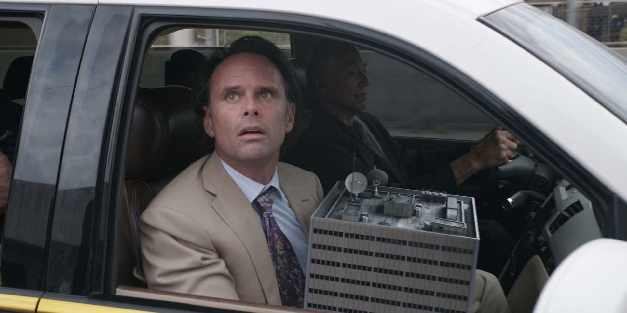 Sonny Burch with a small building looking shocked in Ant-Man and the Wasp.