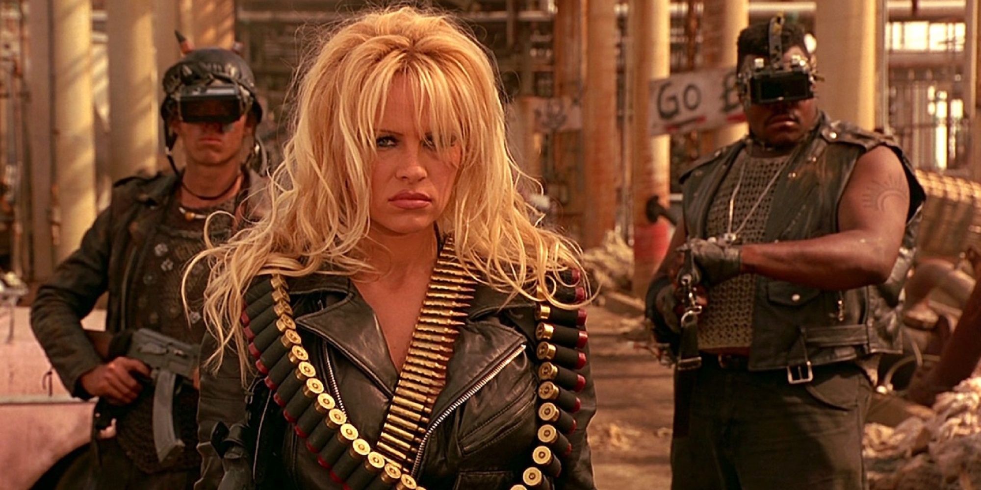 Barb Wire staring the baddies down in a leather jacket.