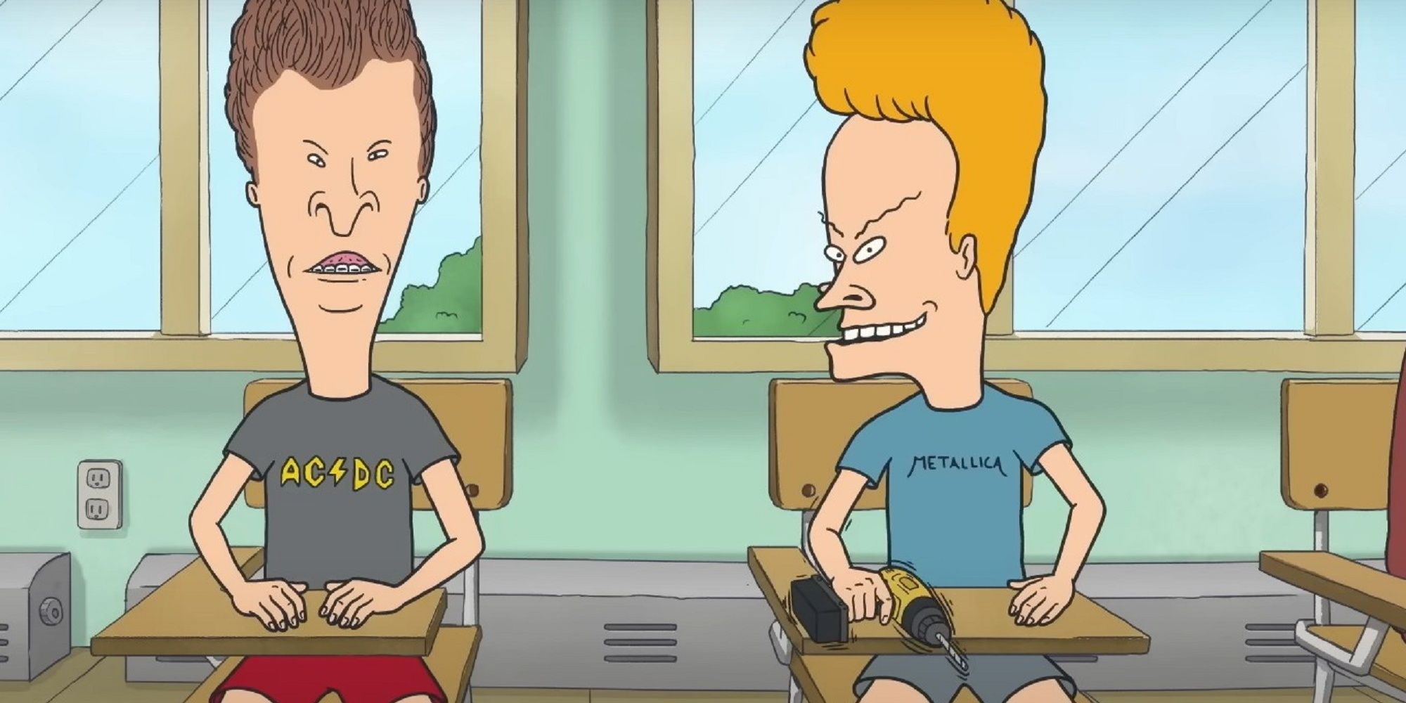 Beavis and Butt-Head sitting at school desks. 