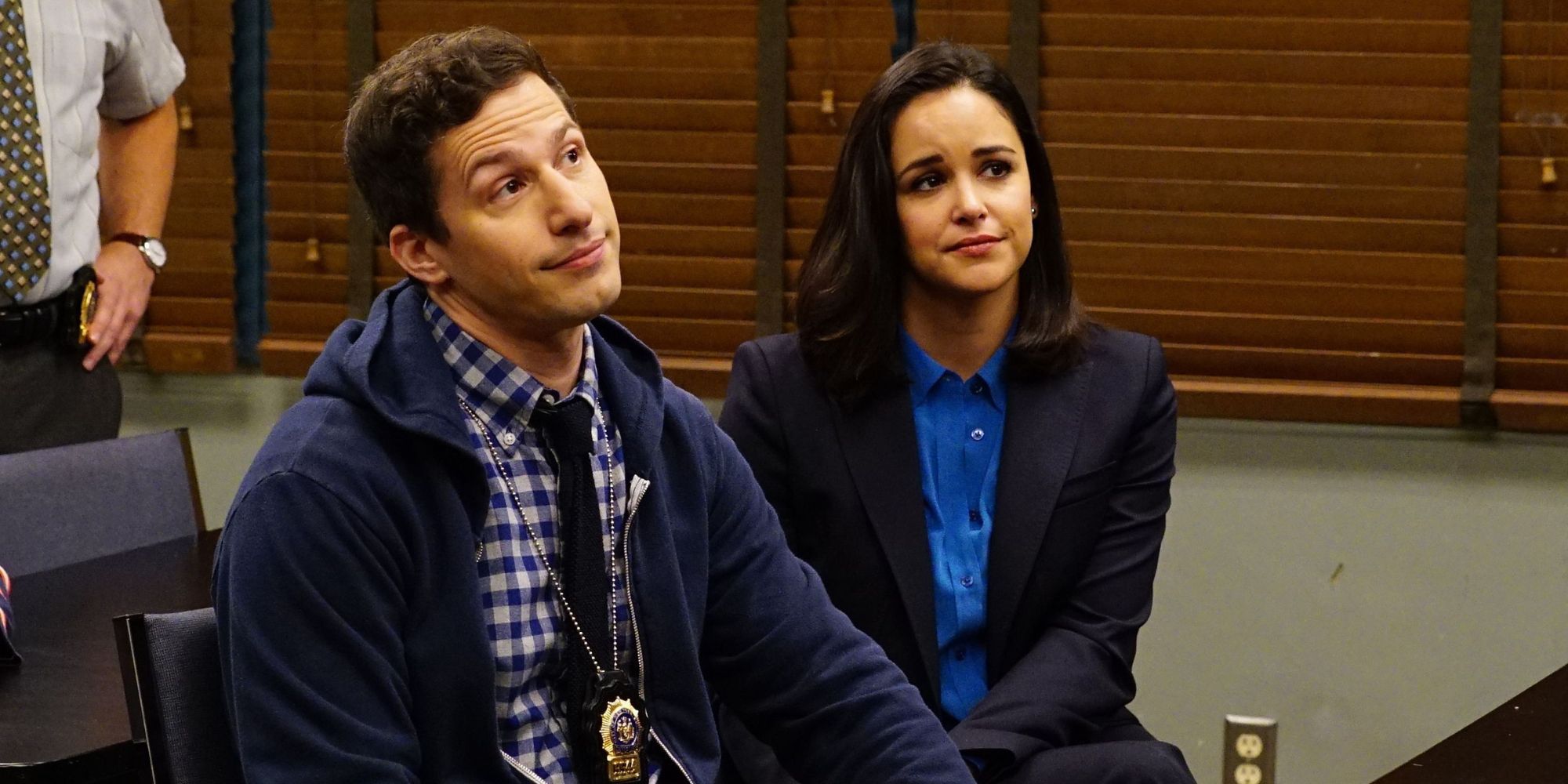 Jake and Amy from Brooklyn Nine-Nine sitting together