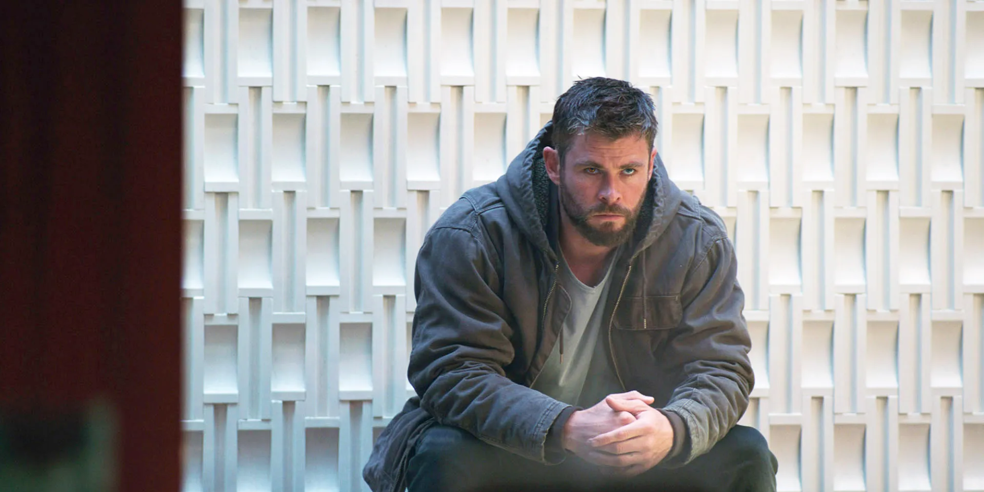  Thor sitting and looking pensive in Endgame sitting in a sweatshirt 