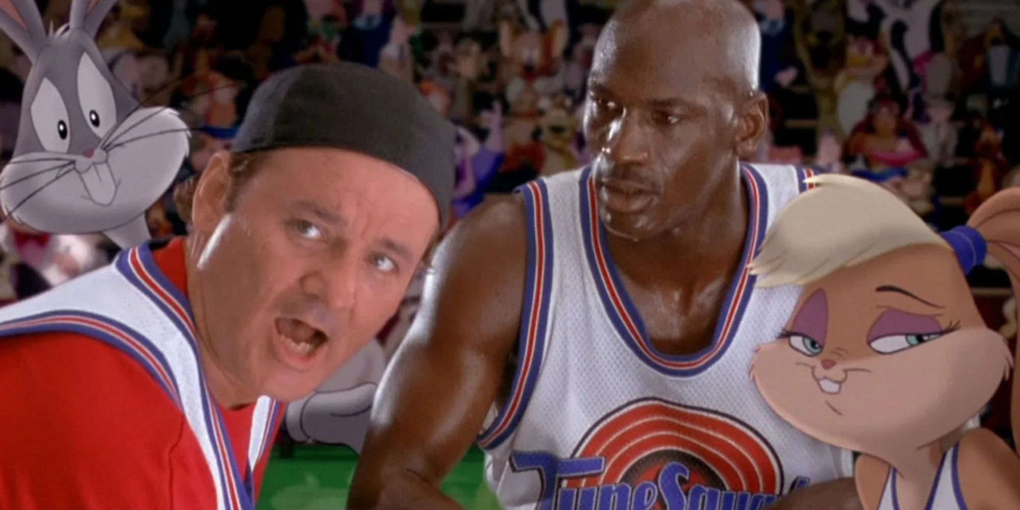 Bill Murray, Bugs Bunny, Michael Jordan, and Lola Bunny in a huddle in Space Jam