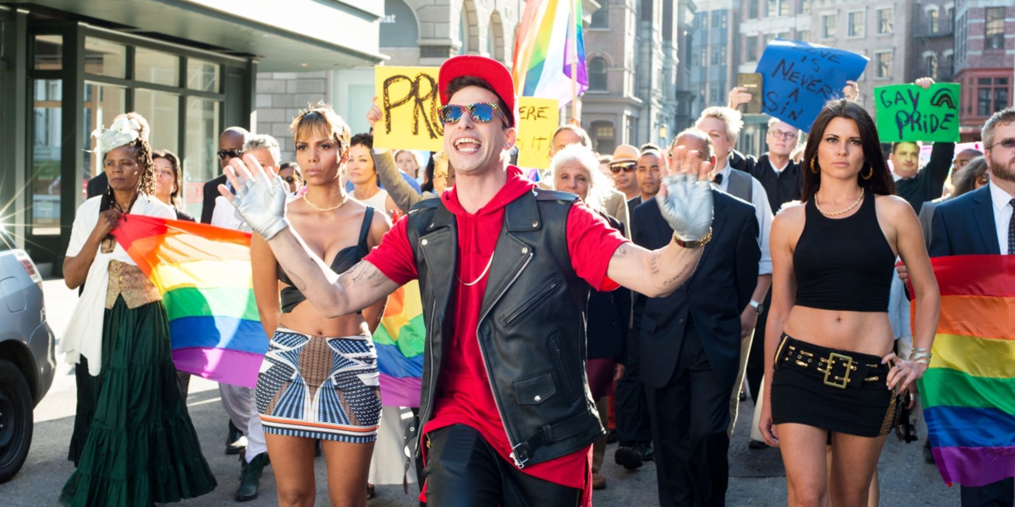 Andy Samberg during a pride parade singing 