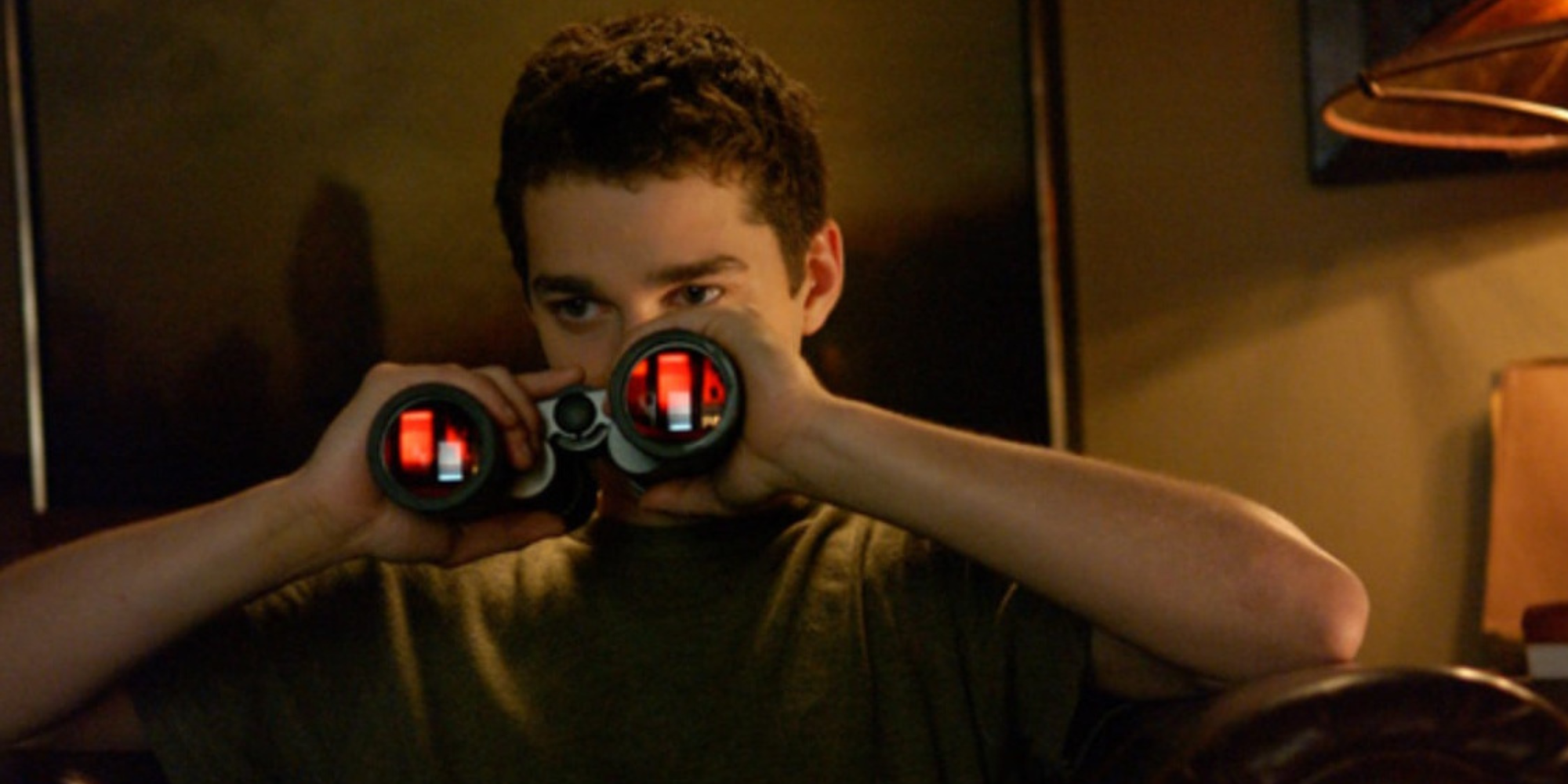 Shia LaBeouf as Kale in Disturbia, using binoculars